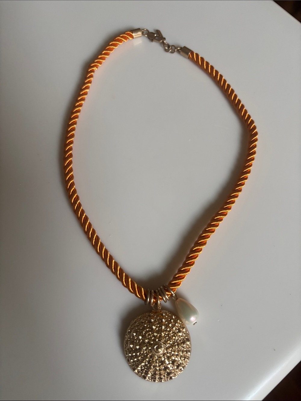 Gold sand dollar Pendant Necklace with Orange Rope and Pearl Accent